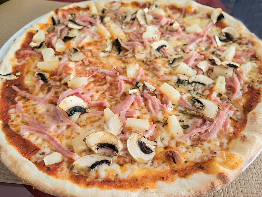 pizza-jamon-champiñones-nickys-pizza-grill-playa-del-carmen